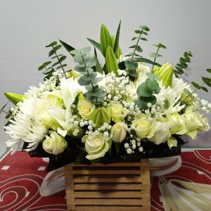 wooden box with white flowers