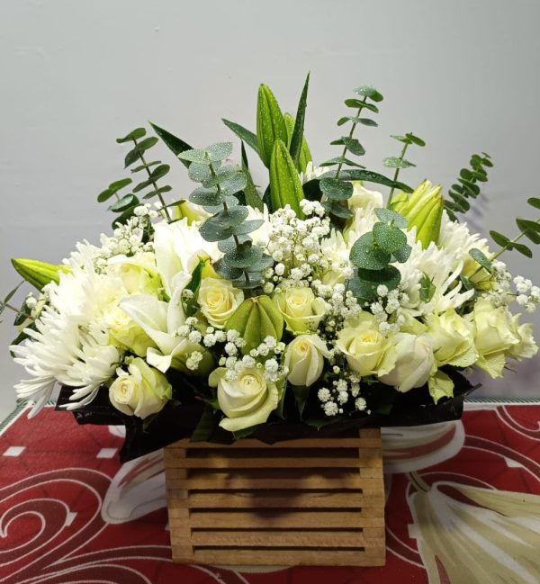 wooden box with white flowers